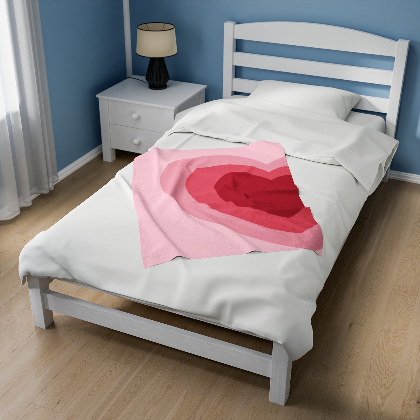 Manta de peluche con forma de corazón de color rosa